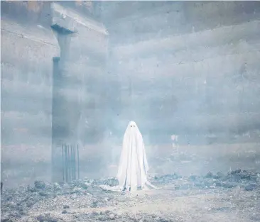  ?? [PHOTO BY BRET CURRY, A24/AP] ?? This image released by A24 shows a scene from the film, “A Ghost Story.”