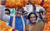  ?? — PTI ?? Uttar Pradesh BJP president Keshav Prasad Maurya with newly joined party leader Rita Bahuguna in Lucknow on Wednesday. Seventeen of her followers joined the saffron party on Tuesday.