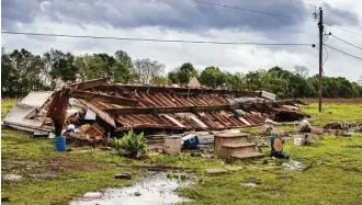  ?? Lucius Fontenot / The Daily Advertiser via Associated Press ?? The remains of a trailer rest where a woman and her 3-year-old daughter were killed in a severe storm Sunday in Breaux Bridge, La. The governor signed a statewide emergency declaratio­n.