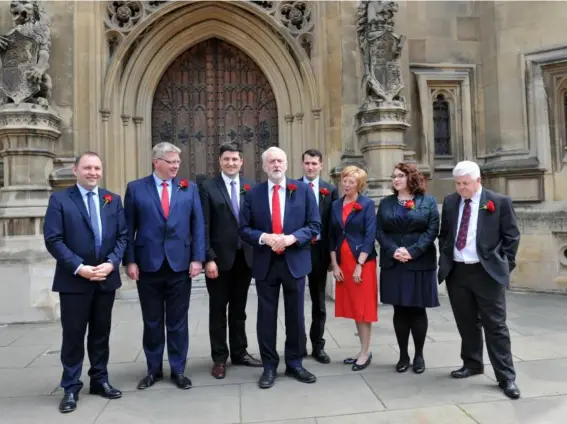  ??  ?? Jeremy Corbyn welcomes Scottish Labour MPs to Parliament after the party regained seats north of the border – but can those successes be multiplied the next time round? (PA)