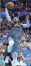  ?? / AP file - Sue Ogrocki ?? A 15-year NBA veteran, Carmelo Anthony will likely be waived by the Hawks if the reported trade involving the Thunder and 76ers comes to fruition.