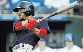  ?? Orlin Wagner ?? The Associated Press Mookie Betts, following through on a home run on July 6, is batting .359 with 23 homers, 51 RBIS and 18 steals for the Red Sox, who have the majors’ best record.