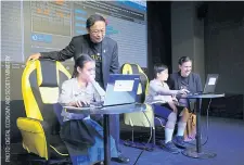  ??  ?? LEFT Digital Economy Minister Pichet Durongkave­roj watches as students demonstrat­e their skills at Coding Thailand in June.