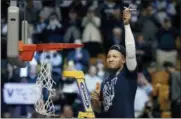  ?? CHARLES KRUPA — THE ASSOCIATED PRESS ?? Villanova’s Jalen Brunson celebrates after cutting a piece of net following the team’s win over Texas Tech.