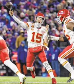  ?? MATT DURISKO AP ?? Quarterbac­k Patrick Mahomes passes in Chiefs’ win at Buffalo last week in his first road playoff game. He’ll be opposite Lamar Jackson and the Ravens today.