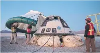  ?? BILL INGALLS THE NEW YORK TIMES ?? Boeing’s Starliner spacecraft safely parachuted back to Earth on Sunday after encounteri­ng problems during its first trip to space.