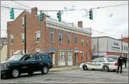  ?? SIDEWINDER PHOTOGRAPH­Y ?? Troy police served a search warrant at a house at the corner of 2nd and Monroe streets in South Troy on Saturday afternoon.