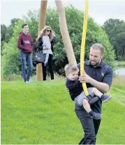  ??  ?? Zipping along Youngsters of all ages enjoyed the crannog on its opening day