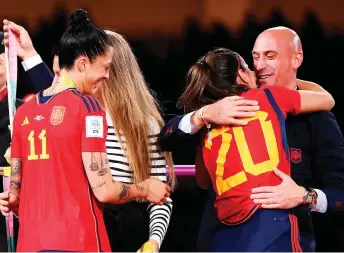  ?? — AFP file ?? Spain’s defender Rocio Galvez is congratula­ted by Rubiales (right) next to Hermoso after winning the Australia and New Zealand Women’s World Cup final match between Spain and England at Stadium Australia in Sydney.