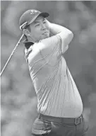  ?? STREETER LECKA/GETTY IMAGES ?? Byeong Hun An hits a tee shot on the fifth hole during the third round of the Wyndham Championsh­ip.