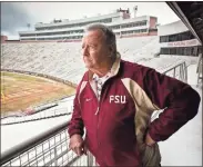  ?? Jon M. Fletcher/Florida Times-un ?? Standing on an upper deck just outside his office in Doak Campbell Stadium, Florida State University head football coach Bobby Bowden looks out on the field that bears his name. Bowden led the Seminoles from 1976 through the 2009 season.
