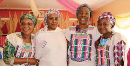  ??  ?? L-R: The Assistant General Secretary, Associatio­n of Profession­al Women Engineers of Nigeria (APWEN), Ramatu Aminu; APWEN President, Maryam Bala; Felicia Nnenna Agubata and Fatima dressed in Fulani attire, gift from the Emir of Misau, Alhaji Ahmad Sulieman, during the Dr. Maikanti Baru engineerin­g scholarshi­p for girls award/ cheque presentati­on ceremony at the Emir’s Palace, Misau, Bauchi State... recently