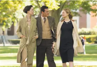  ?? Claire Folger / Annapurna Pictures ?? Rebecca Hall as Elizabeth Marston (left), Luke Evans as William Marston and Bella Heathcote as Olive Byrne in “Professor Marston and the Wonder Women.”