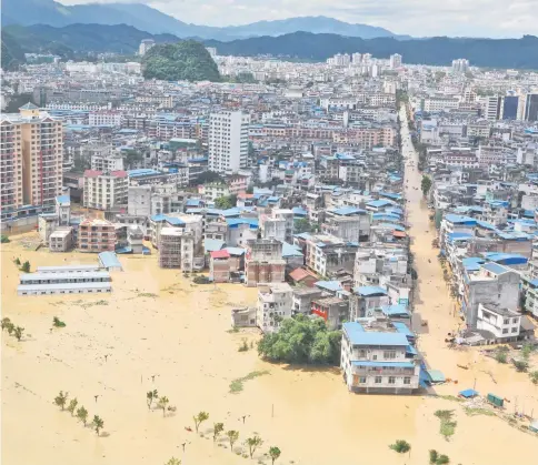  ??  ?? A general view of a flooded area in Liuzhou, Guangxi province. — Reuters photo