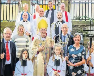  ??  ?? Reverend John Whittaker was inducted as team rector of the parish of Putney. Credit: Adrian Weed.