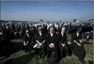  ?? PETR DAVID JOSEK — THE ASSOCIATED PRESS ?? Nuns attend a Mass celebrated by Pope Francis Sept. 15in the esplanade of the National Shrine in Sastin, Slovakia.