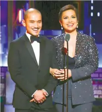  ?? FOTO / AP ?? MISS SAIGON. Jon Jon Briones (left), who plays “the engineer” in the West End production of “Miss Saigon,” and Lea Salonga, the original Kim, introduce the performanc­e of the cast of the Broadway revival of "Miss Saigon."