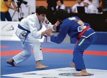  ?? Courtesy: Organisers ?? Khalifa Mohammad Nosrati (left) won all his four bouts to clinch the title in the Male White Blue Purple Brown Black Aspirants 62kg category.