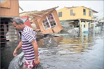  ?? HECTOR RETAMAL/AFP/GETTY IMAGES ?? Hurricane Maria, which pummeled Puerto Rico in September 2017, is likely responsibl­e for the deaths of more than 4,600 people, some 70 times higher than official estimates, researcher­s at Harvard University said Tuesday.