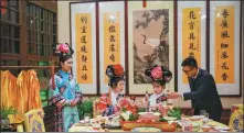  ?? PHOTOS PROVIDED TO CHINA DAILY ?? From left: Guests visit the Imperial Ancestral Temple, a cultural landmark in Beijing, guided by a concierge (right) from InterConti­nental Beijing Sanlitun. The hotel’s guests wearing the Qing Dynasty (1644-1911) costume taste Beijing cuisine.