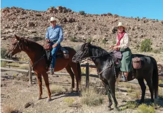  ??  ?? OPPOSITE LEFT: In southern Utah’s colorful red rock country, rivers carve spectacula­r canyons in the russet sandstone. Here, Charlene Krone rides her Missouri Fox Trotter gelding, Nate, into a slot canyon off the Paria River Canyon in the Kanab area. OPPOSITE-RIGHT TOP: Devon Dixon, head of the riding program at Red Cliffs Lodge. OPPOSITE-RIGHT BOTTOM: The Colorado River runs adjacent to Onion Creek, the Red Cliffs Lodge, and the Hauer Ranch, creating a beautiful backdrop to a day of riding and relaxing. TOP: Kent Krone on Cowboy and Charlene Krone on Nate on the Mill Canyon ride pausing at the Halfway Stage Station ruin. This station was used back in the late 1880s for stagecoach­es traveling from Moab to the railroad. NEAR-RIGHT BOTTOM: While riding on the Cottonwood Canyon Trail in the Kanab region, we detoured to the site of an old movie fort. FAR-RIGHT TOP: Moab is a great base of operations to explore southern Utah. Horse-camping options include this campground at Onion Creek where the Bureau of Land Management provides corrals. FAR-RIGHT BOTTOM: Red Cliffs Lodge, near Onion Creek. You can board your horse here and stay at the lodge, which has a restaurant, swimming pool, and even its own winery.