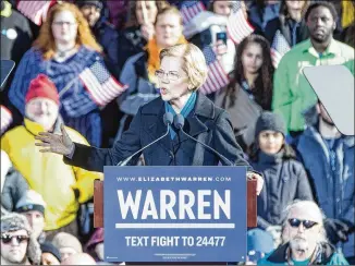  ?? SCOTT EISEN / GETTY IMAGES ?? Sen. Elizabeth Warren, officially announcing her presidenti­al bid Saturday in her home state, decried “too little accountabi­lity for the rich, too little opportunit­y for everyone else.” She avoided taking direct jabs at President Donald Trump, aiming for a broader institutio­nal shift instead.
