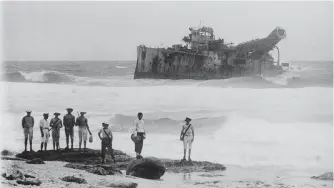  ??  ?? ■ The wreck of SMS Emden after her destructio­n by HMAS Sydney. (Allan Green)