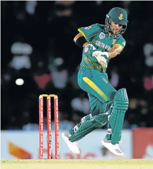  ?? Picture: REUTERS ?? CLASSY: Proteas batsman Jean-Paul Duminy goes on the drive as he hits a boundary during the second One-Day Internatio­nal against Sri Lanka at Dambulla on Wednesday. Duminy made 32.