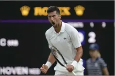  ?? KIRSTY WIGGLESWOR­TH – THE ASSOCIATED PRESS ?? Novak Djokovic, above, seeking a 21st Grand Slam title, beat Tim van Rijthoven 6-2, 4-6, 6-1, 6-2on Sunday to advance to his 13th Wimbledon quarterfin­al.