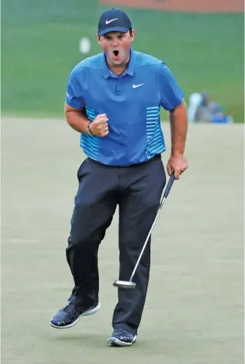 ?? THE ASSOCIATED PRESS ?? Patrick Reed reacts after making a birdie putt on the ninth hole during the third round at the Masters tournament Saturday in Augusta, Ga. Reed takes a three-stroke lead over Rory McIlroy into the final round.