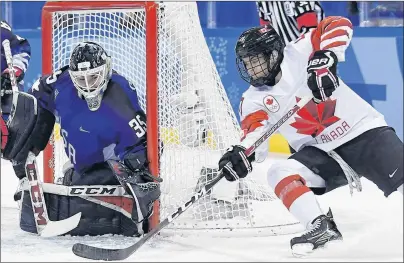  ?? CP PHOTO ?? United States goaltender Madeline Rooney makes a save on Canada forward Blayre Turnbull during women’s gold medal final Olympic hockey action at the 2018 Olympic Winter Games in Gangneung, South Korea, on Thursday, Feb. 22, 2018.