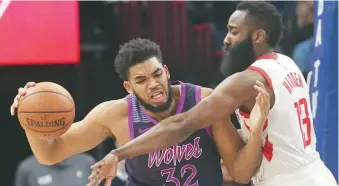  ?? AP/JIM MONE ?? Karl-anthony Towns es defendido por James Harden el pasado 13 de febrero en Minnesota.