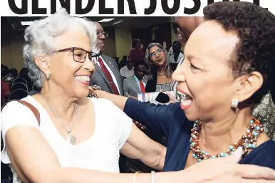  ?? BROWN/ PHOTOGRAPH­ER RUDOLPH ?? Professor Elsa Leo-Rhynie (left) greets Professor Eudine Barriteau, pro vice-chancellor and principal of the UWI, Cave Hill Campus, at the launch of the UWI gender policy at the UWI Regional Headquarte­rs on Tuesday.