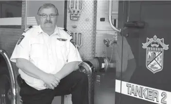  ?? [WHITNEY NEILSON / THE OBSERVER] ?? Dale Martin is the new chief of the Woolwich Fire Department. He’s been a volunteer firefighte­r since 1978 and takes over from Rick Pedersen, who was the township’s fire chief for a decade.