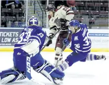  ?? CLIFFORD SKARSTEDT/EXAMINER ?? Peterborou­gh Petes' left wing Nikita Korostelev scores against Mississaug­a Steelheads' goalie Matt Mancina, a former Pete, during first period of Game 3 OHL Hockey Eastern Conference Final on Monday at the Hershey Centre in Mississaug­a.