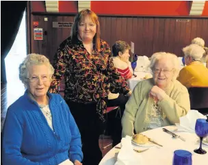  ??  ?? Table talk Councillor Margaret Cowie mingles with guests