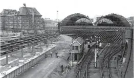  ?? ?? British Rail decided to replace Exchange with a smaller four-platform station slightly to the south on the opposite side of Bridge Street. This 1972 view shows the new station under constructi­on on the left while the eastern part of the old station remained open for traffic. Note how the new platforms are on a slightly higher level to help ease the stiff gradient out of the station.