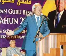  ?? PIC BY MOHD FADLI HAMZAH ?? Education Minister Datuk Seri Mahdzir Khalid giving his opening speech at the 2017 gathering of principals and headmaster­s of public religious schools in Putrajaya yesterday.