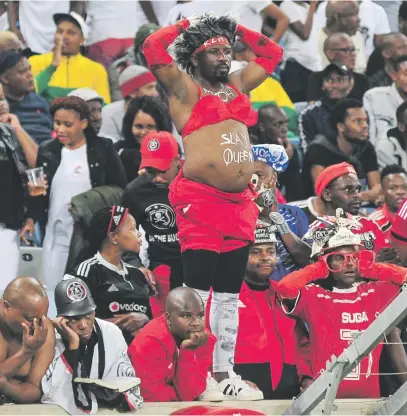  ?? Picture: Gallo Images ?? SHATTERED. Orlando Pirates fans show their disappoint­ment after losing 4-3 in their Absa Premiershi­p clash against Bidvest Wits at the Moses Mabhida Stadium in Durban on Saturday.
