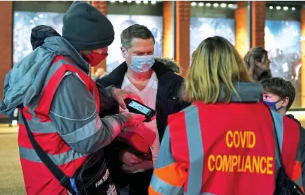  ?? PA ?? Compliance: Covid procedures at Anfield last night for fans attending Liverpool’s home game