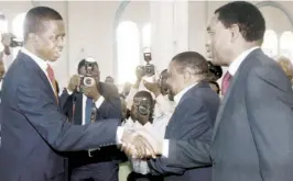  ??  ?? FILE PHOTO: President Edgar Lungu greets UPND president Hakainde Hichilema