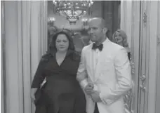  ?? LARRY HORRICKS ?? Melissa McCarthy and Jason Statham go undercover in Spy.