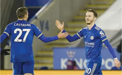  ?? Picture: AFP ?? TAKE FIVE. Leicester City’s James Maddison (right) celebrates after scoring a goal during their English Premier League match against Chelsea at King Power Stadium on Tuesday night.