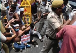  ?? BUNNY SMITH ?? Indian Youth Congress workers stage a protest against the Central government over privatisat­ion of Indian Railways in New Delhi on Friday. —