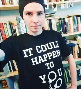  ??  ?? ‘It could happen to you’: In a T-shirt referring to her conviction