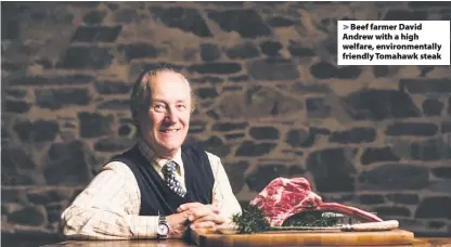  ??  ?? > Beef farmer David Andrew with a high welfare, environmen­tally friendly Tomahawk steak
