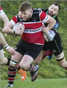  ??  ?? Wicklow’s Ben Porter is tackled by De La Salle’s Adam Brodigan.