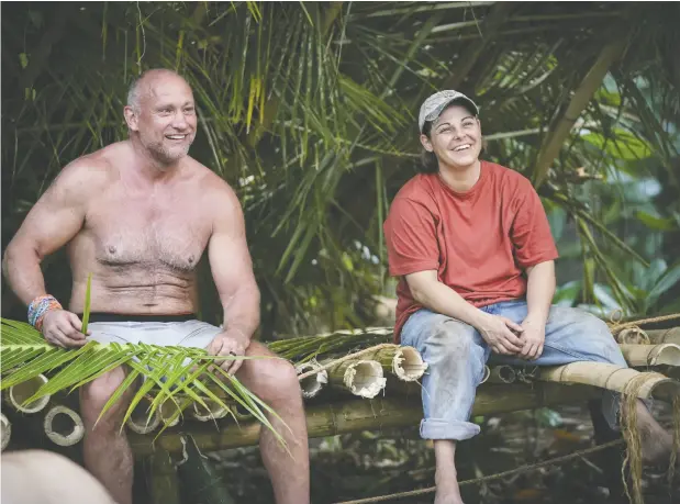  ?? CBS Broadcasti­n
g Inc ?? Tom Laidlaw, left, who played 705 games in the NHL with the New York Rangers and Los Angeles Kings, on Survivor: Island of the Idols.