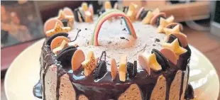  ??  ?? The lockdown birthday cake – covered with Oreo buttercrea­m icing.