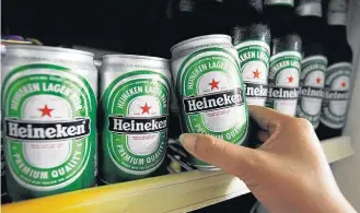  ?? SUKREE SUKPLANG/REUTERS–15/9/2014 ?? Marcas. Portfólio da Heineken no País inclui ainda Kaiser, Amstel, Bavaria, Xingu e Sol